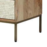 Wooden bedside table corner with bone inlay detail and metal legs.
