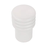 White round side table with stacked, ribbed design.