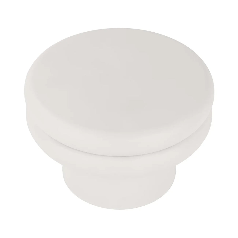 White round coffee table with smooth, minimalist design.