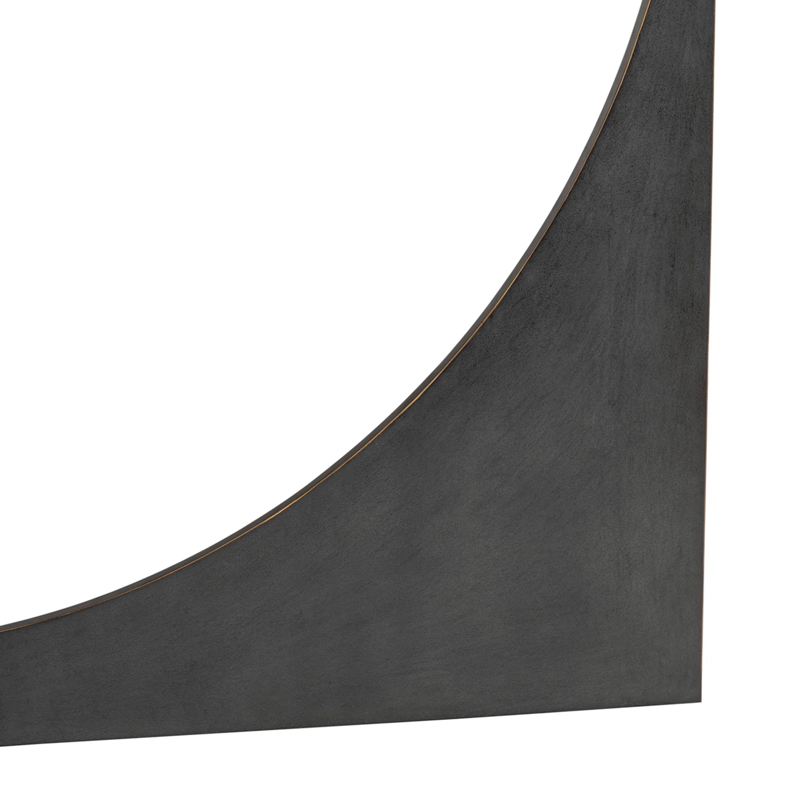 Dark grey table leg with smooth, curved texture detail.