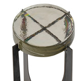 Round glass table top with textured surface and metal legs.