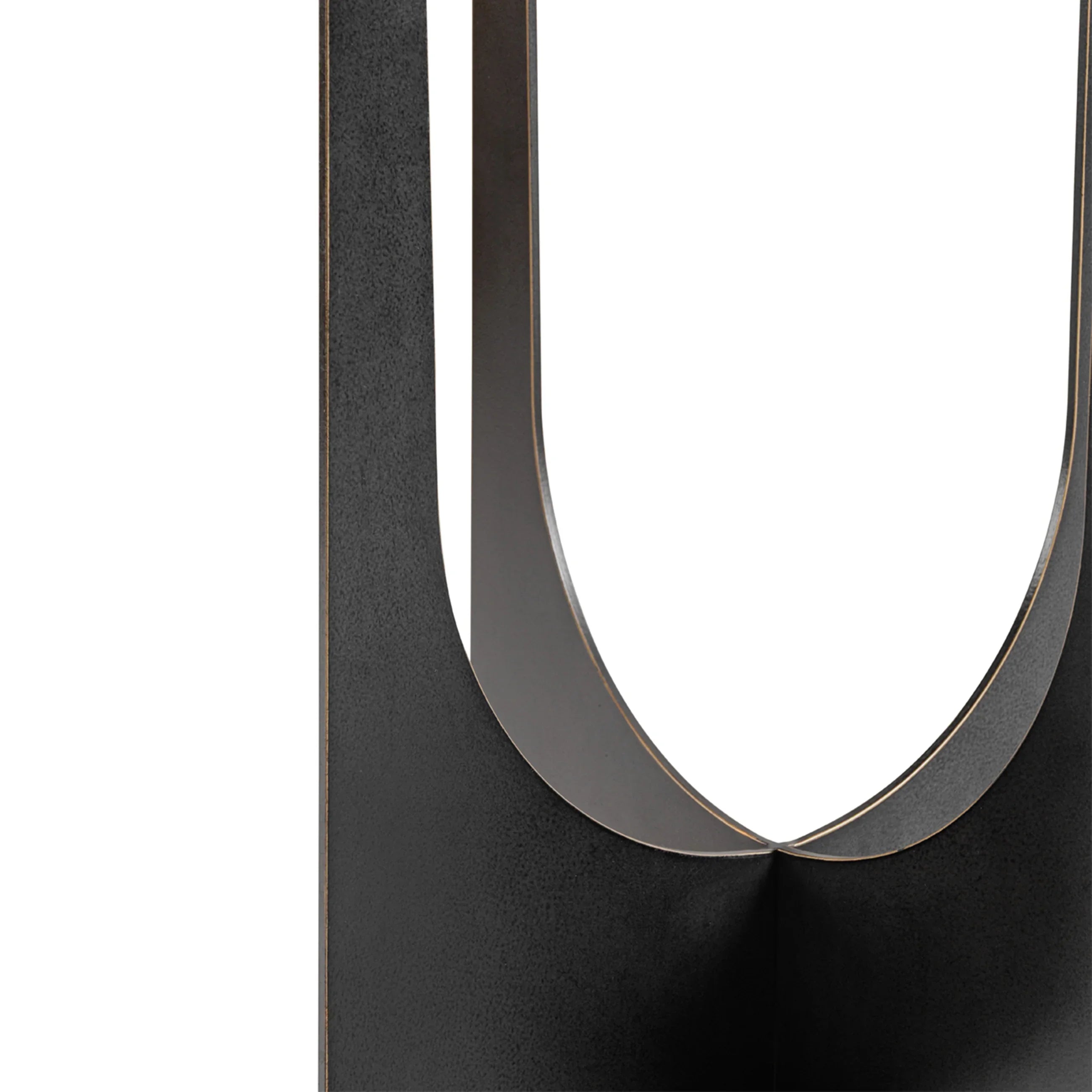 Black metal table leg with curved design detail.