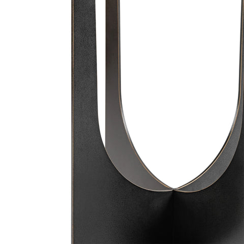 Black metal table leg with curved design detail.