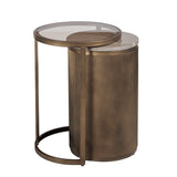 Gold nesting side tables with ribbed cylindrical base and glass top.