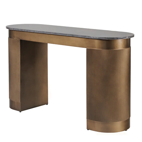 Gold study desk with ribbed detailing and dark tabletop.
