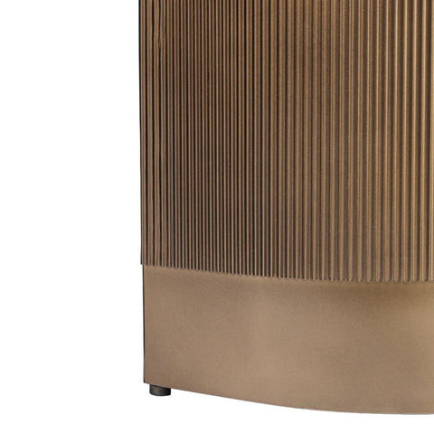 Gold desk panel with vertical ribbed texture detail.