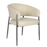 Beige boucle dining chair with curved back and metal legs.