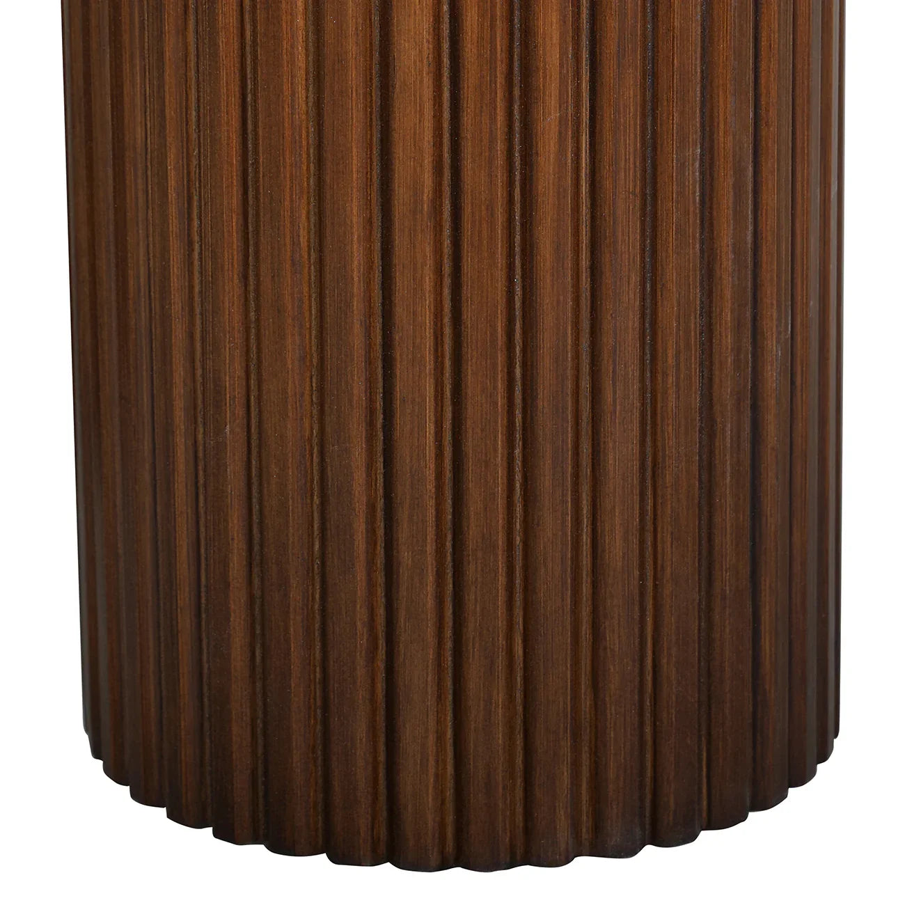 Brown wooden table base with vertical fluted texture.