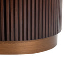 Dark wood cabinet base with vertical grooves and smooth finish.