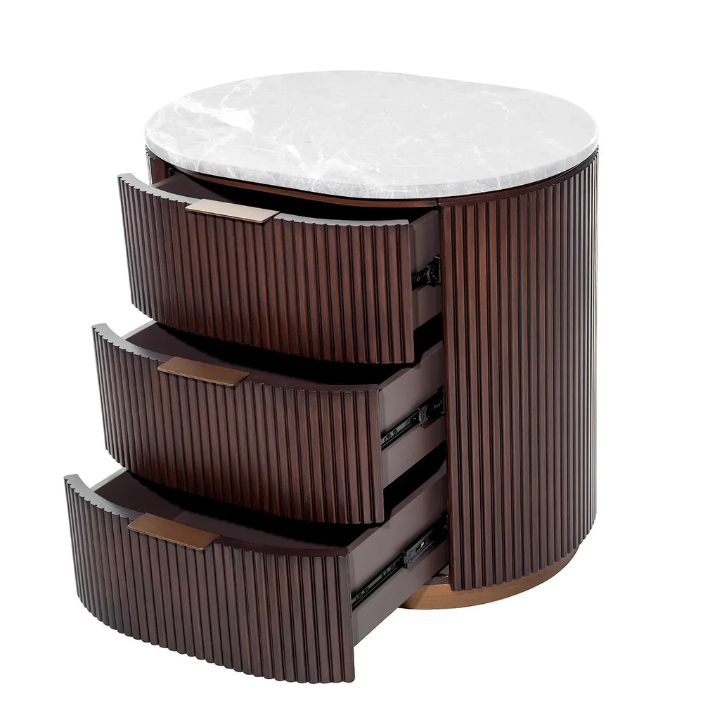 Dark wood bedside chest with three open drawers and a marble top.