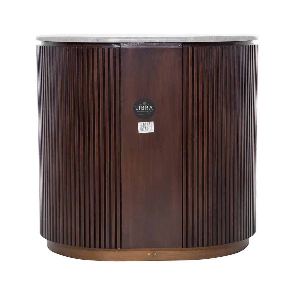 Dark wood chest with vertical grooves and a round marble top.