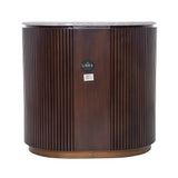 Dark wood chest with vertical grooves and a round marble top.