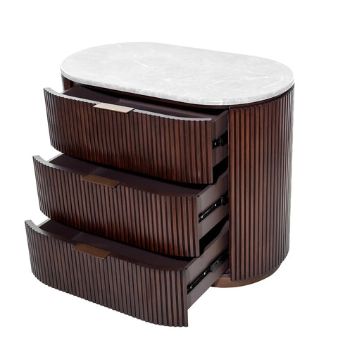 Dark wood chest with three open drawers and a marble top.