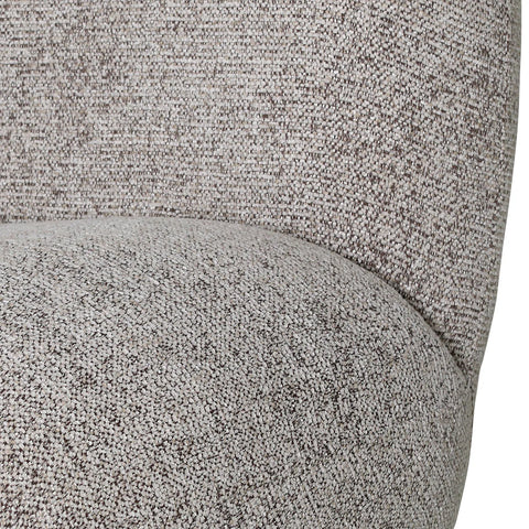 Beige chair fabric with textured woven detail.