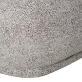Beige chair fabric showing detailed woven texture.