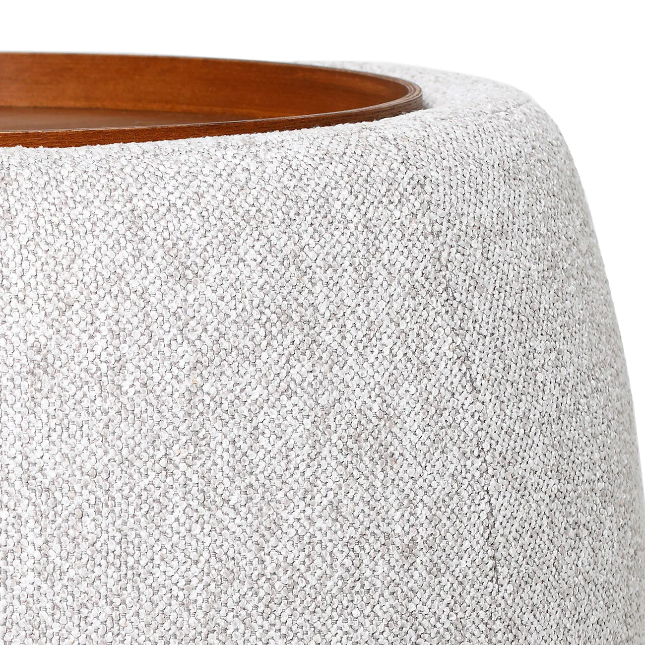 Oatmeal ottoman with textured fabric and wooden top edge.