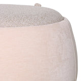 Beige storage bench with textured fabric detail on top.