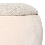 Beige stool with textured fabric top and smooth sides.