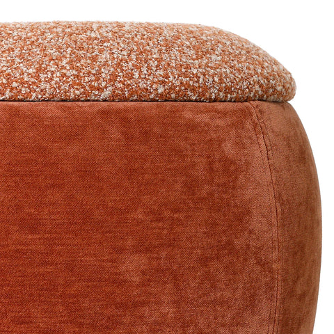 Terracotta stool with textured fabric top and smooth velvet side.