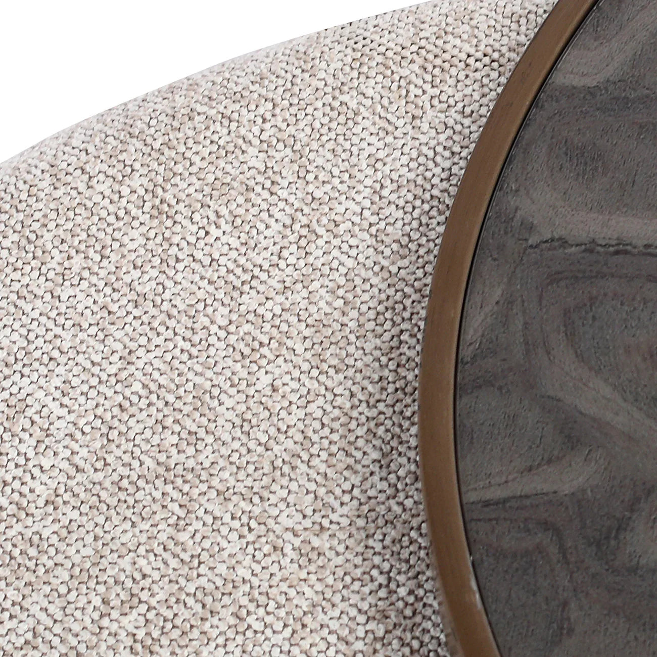 Beige textured pouffe with dark wood table edge detail.