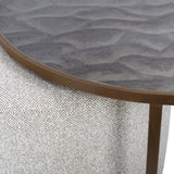 Dark wood tabletop with ripple texture and woven fabric detail underneath.