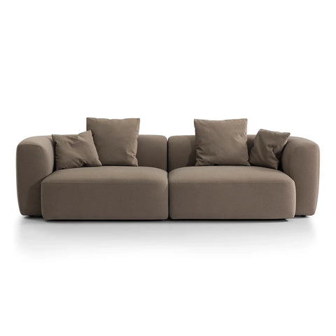 Soft truffle velvet sofa with plush cushions in a minimalist setting | Home Centre Direct UK