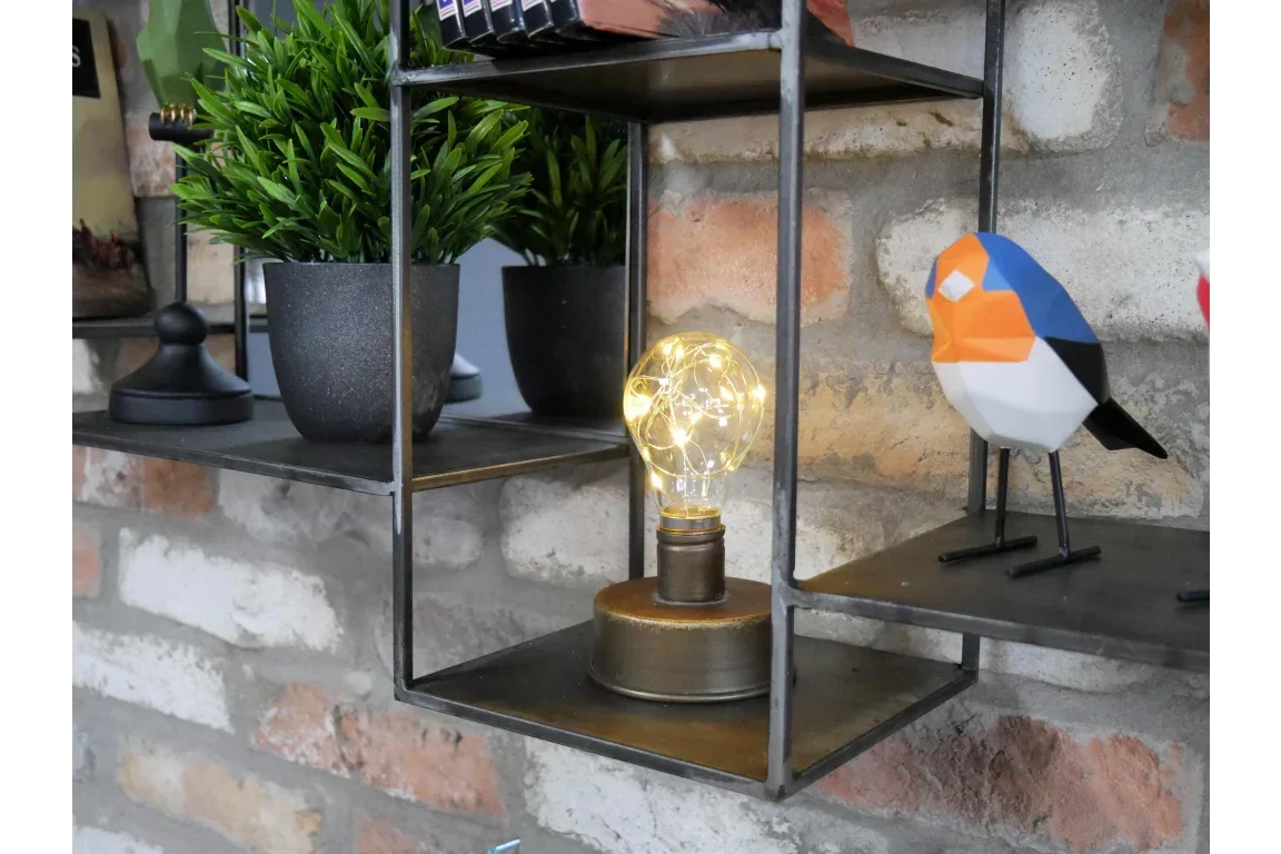 Industrial metal wall shelf with LED table lamp, artificial plant and decorative bird