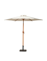 Beige garden parasol with wooden pole and crank handle on sturdy black base