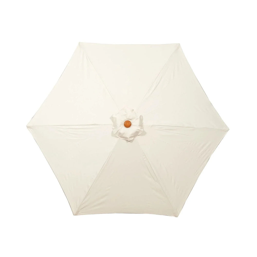 Cream garden parasol canopy top view with wooden centre hub