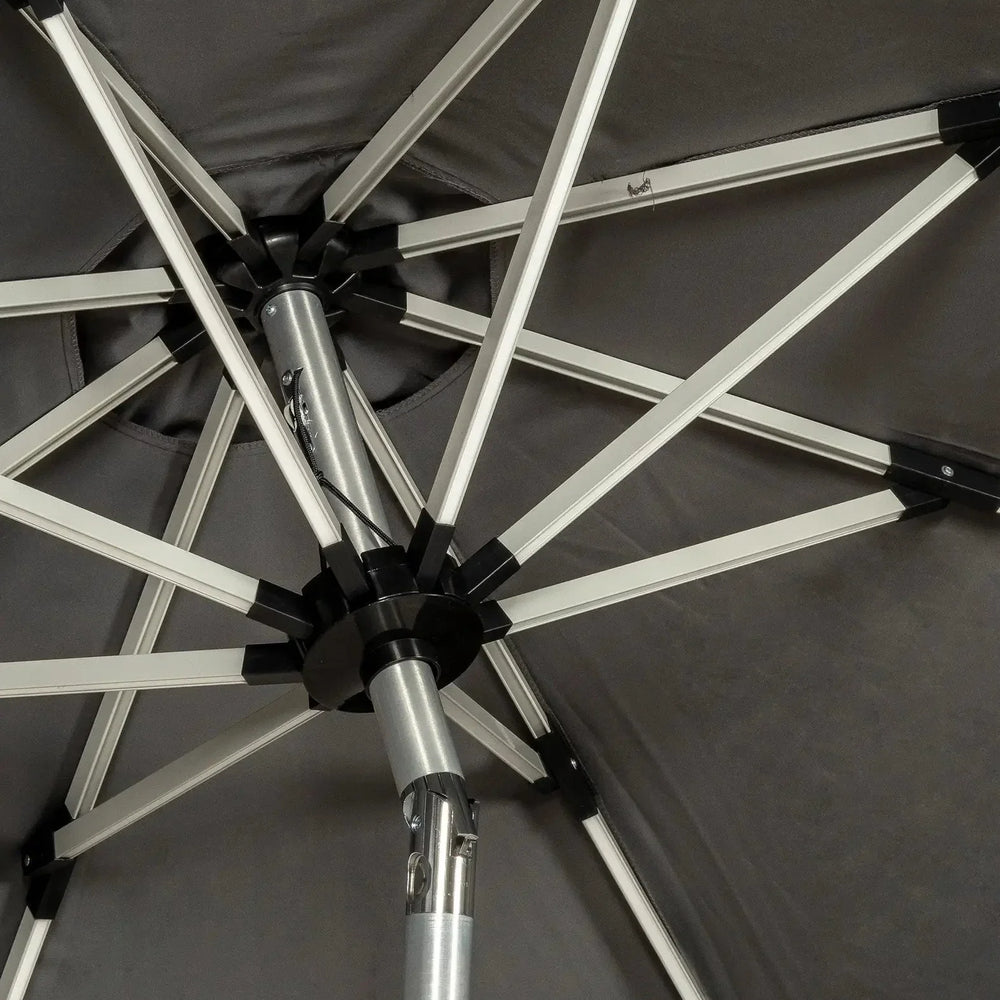 Aluminium garden parasol frame and support ribs viewed from below, grey canopy