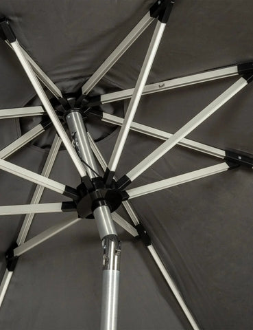 Aluminium garden parasol frame and support ribs viewed from below, grey canopy