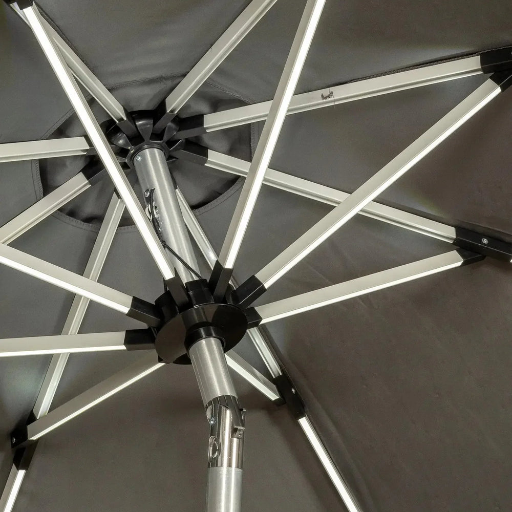 Close view of metal frame and support ribs on a grey garden parasol