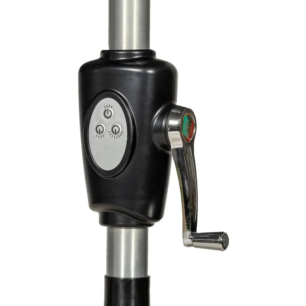 Manual crank handle and control panel on metal parasol pole close-up