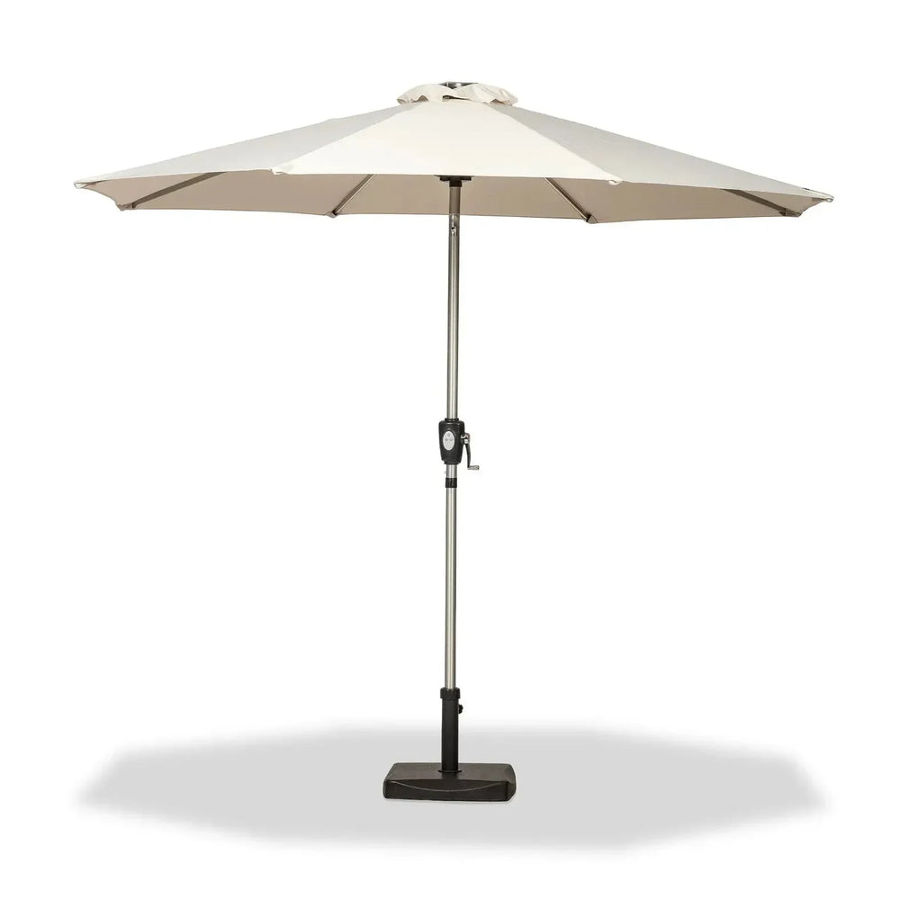 Cream garden parasol with crank handle and metal pole on black square base, front view