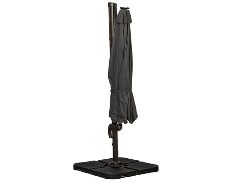 Closed grey cantilever garden parasol with weighted base on white background