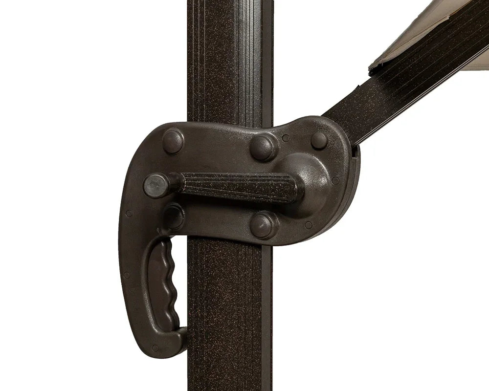 Close-up of brown metal outdoor parasol handle and support arm mechanism