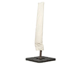 Cream patio parasol cover on dark weighted base for outdoor umbrella protection
