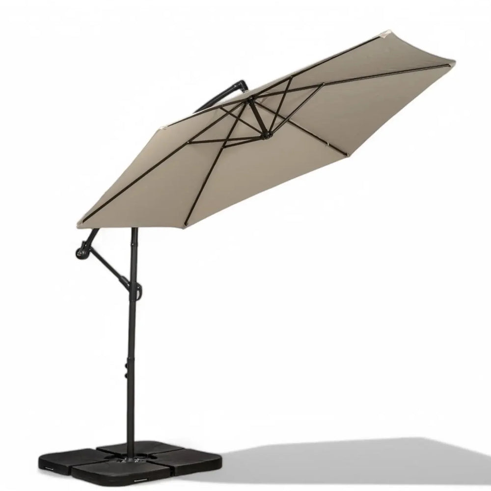 Beige cantilever garden parasol with black base and metal frame on white background