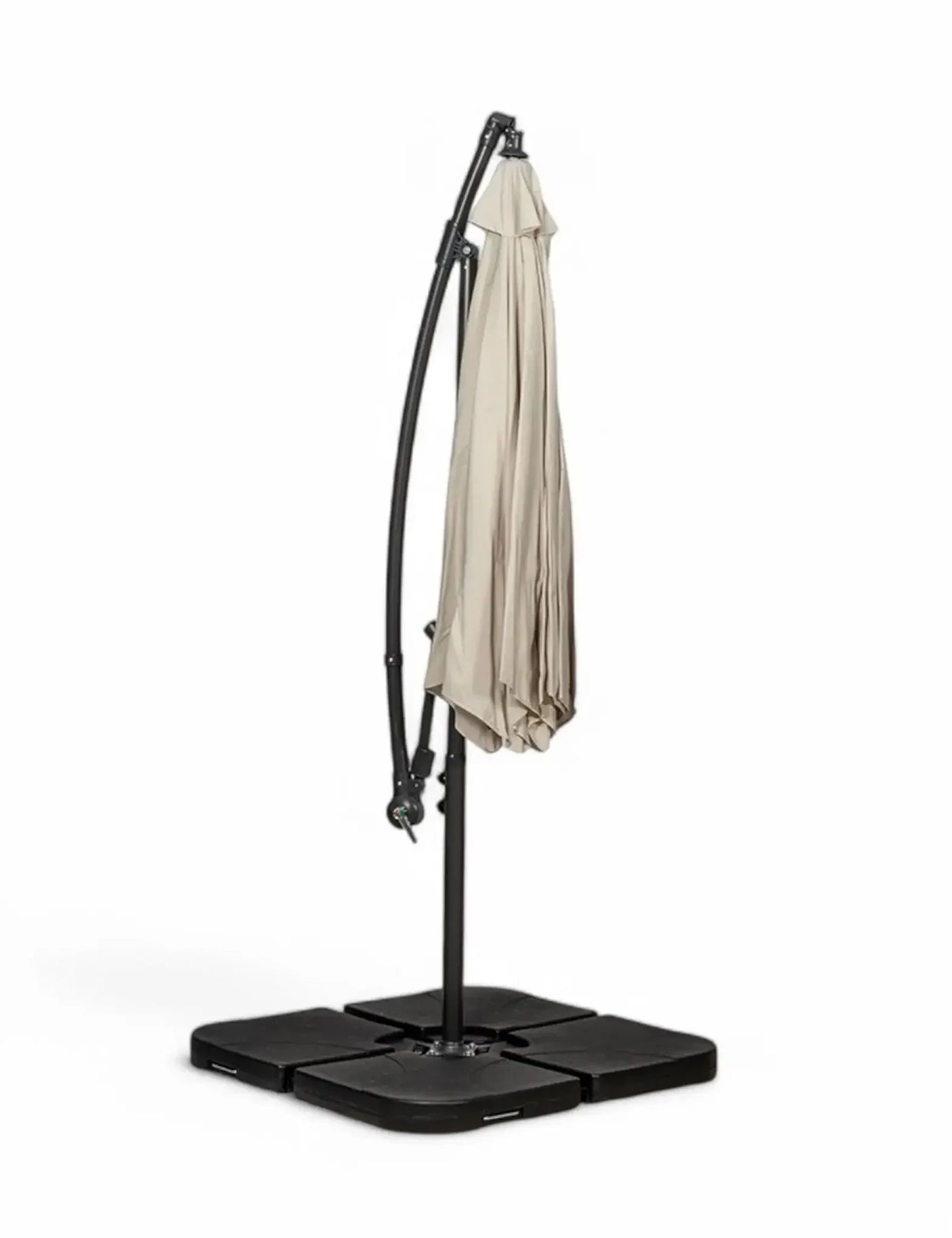 Beige cantilever garden parasol with closed canopy and black weighted base