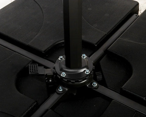 Black parasol base with cross support arms and secure bolt fittings on patio