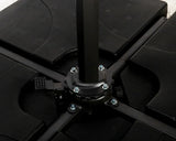 Black parasol base with cross support arms and secure bolt fittings on patio