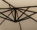 Closeup of beige garden parasol canopy with black metal support frame