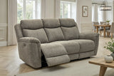 A three-seat reclining loveseat in textured light gray upholstery, shown with the front footrest extended in a bright, modern living room.