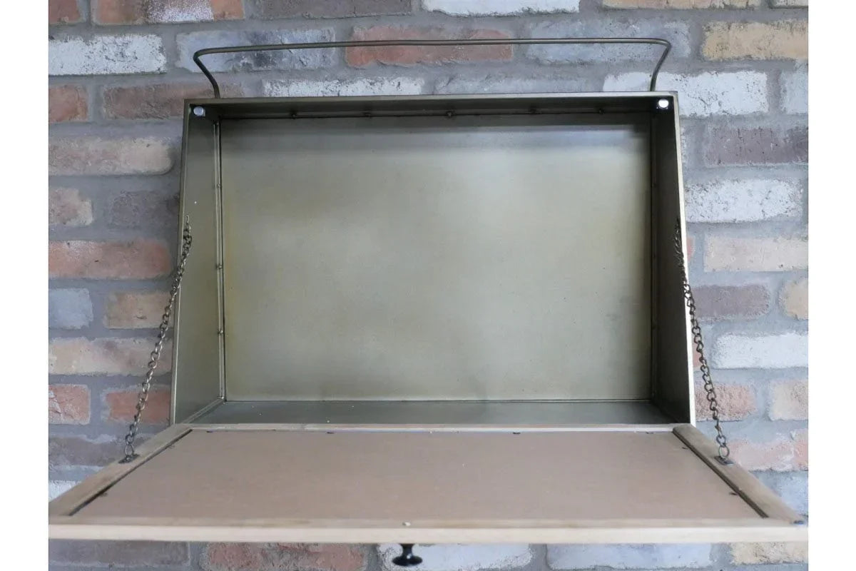 Metal wall mounted drop leaf desk with chains against exposed brick background