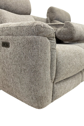 Close-up of a gray textured recliner sofa showing the armrest, side panel, and part of the seat cushion against a white background.