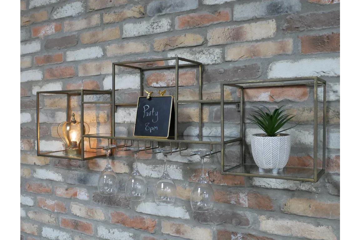 Metal wall mounted shelf with wine glass holder, table lamp, chalkboard, and potted plant