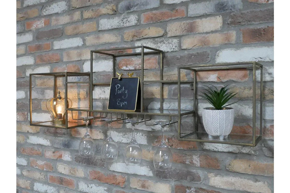 Gold metal wall shelf with wine glass rack, LED bulb, chalkboard, and potted plant decor