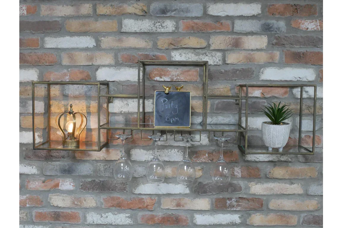 Metal wall wine glass holder with lamp, chalkboard, and plant on a brick wall