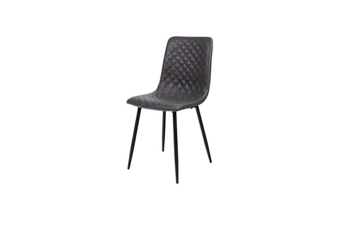 Grey quilted dining chair with metal legs and modern design
