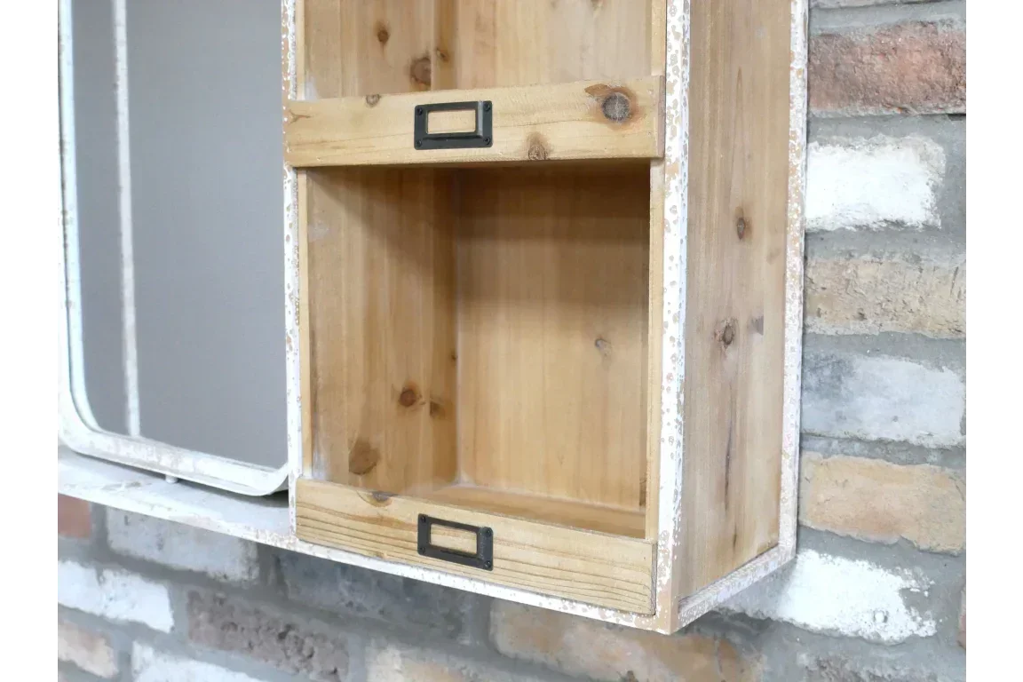 Rustic wood wall shelf with two drawers and metal label holders against brick backdrop